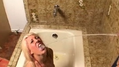 Skinny small titted blonde in shower