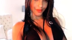 Busty curly brunette with big boobs fucks on couch