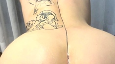 Big white ass in the bathroom masturbating with toy