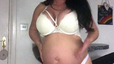 Busty curly brunette with big boobs fucks on couch