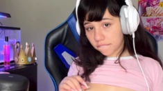 Busty babe playing with her big boobs