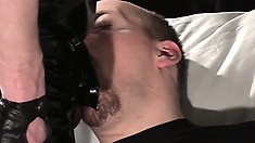 With a hard dick in his face and his hands tied, he has no choice but to open wide