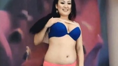 Asian Girl Rocking Ducks Dance