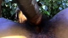 Cute ebony girl Tiffany welcomes a black rod in her hairy cunt outside